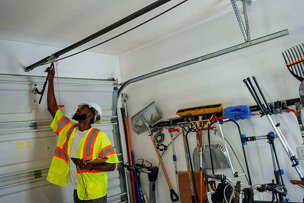 Professional Garage Door Panel Replacement technician working in Howard County County, NE